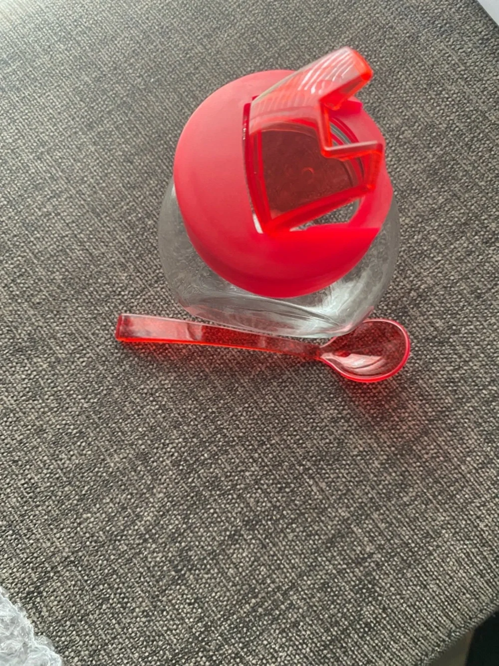 Clear Glass Honey Jar with Red Lid and Spoon